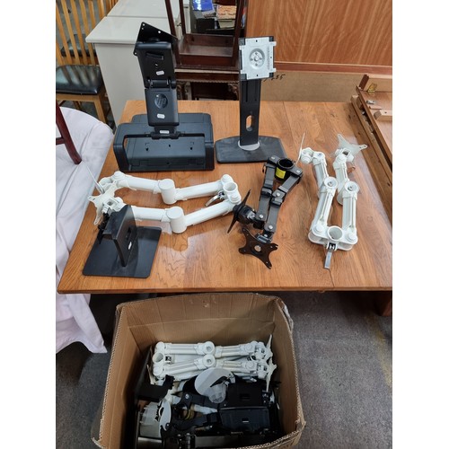 1080 - A box of 14 computer monitor screen mounts arms and stands. Some double articulated models. Great fo... 