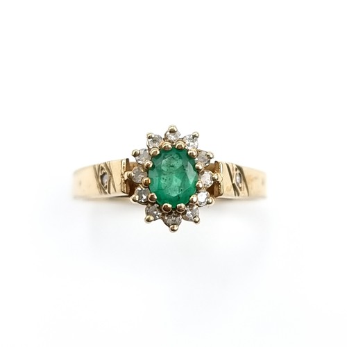 1085 - A diamond and large emerald ring set in nine carat gold. Size - K. Weight - 2.23 grams. Boxed.
Previ... 