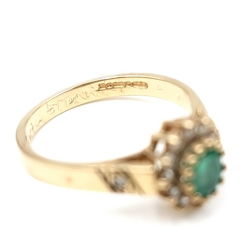 1085 - A diamond and large emerald ring set in nine carat gold. Size - K. Weight - 2.23 grams. Boxed.
Previ... 