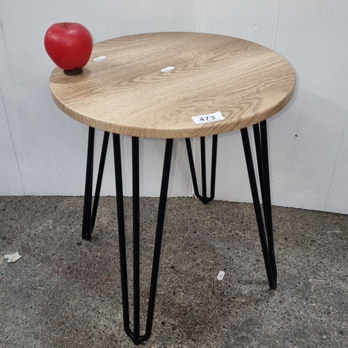 1098 - Round side table with solid wood top and black metal hairpin legs.
Previous in auction on 12.09.24 w... 