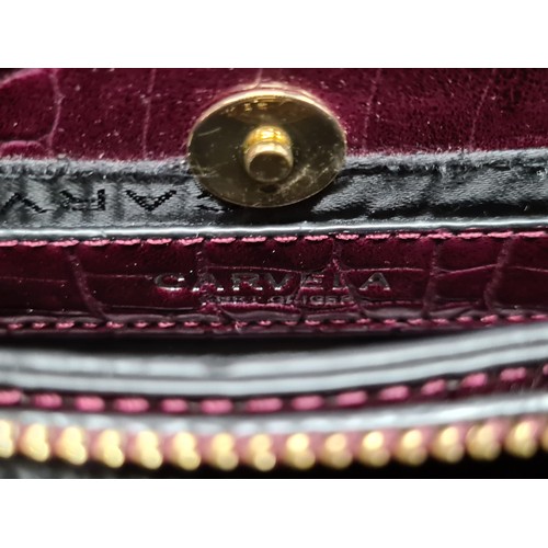 172 - A fabulously stylish ladies Carvela by Kurt Geiger maroon coloured handbag. Complete with long shoul... 