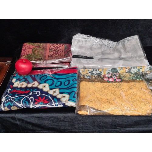 244 - A selection of brand new Ladies pashmina scarves. In unique colours and patterns. Features brands in... 