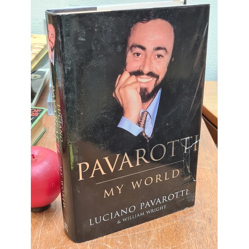 308 - A hand signed first edition hardback book titled 'Pavarotti - My World' Signed by Pavarotti on cover... 