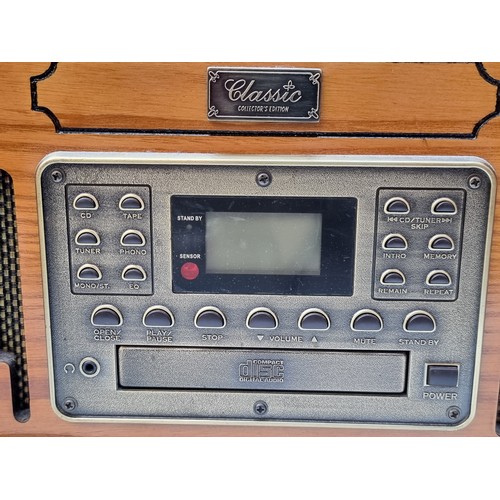 324 - A classic collection edition record player cd cassette player (tapes) and radio with remote control.