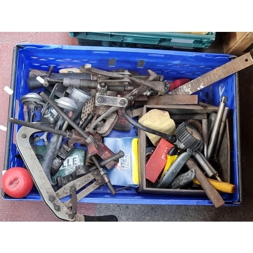 349 - A large crate containing a collection of tools including clamps, Saville washer, a hatchet,  tins an... 