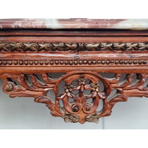 710 - Star Lot : A marble topped French style console table Featuring carved and turned wood tapering legs... 