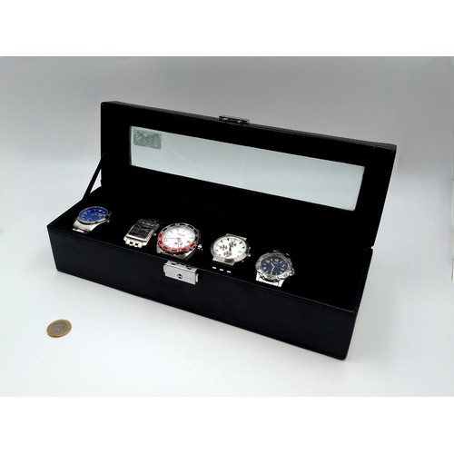 543 - A boxed collection of Men's watches consisting of a Fossil Breaker together with original metal brac... 