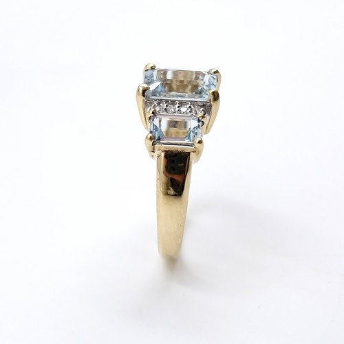 6 - Star lot : A nine carat gold large huge aquamarine and diamond ring. Ring size - O. Weight - 3.55 gr... 