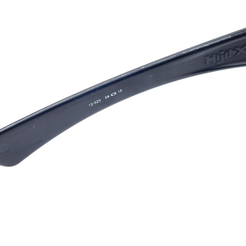 539 - A pair of Oakley Hijinx wrap around sunglasses by Oakley USA marked to frames. Lenses clear.