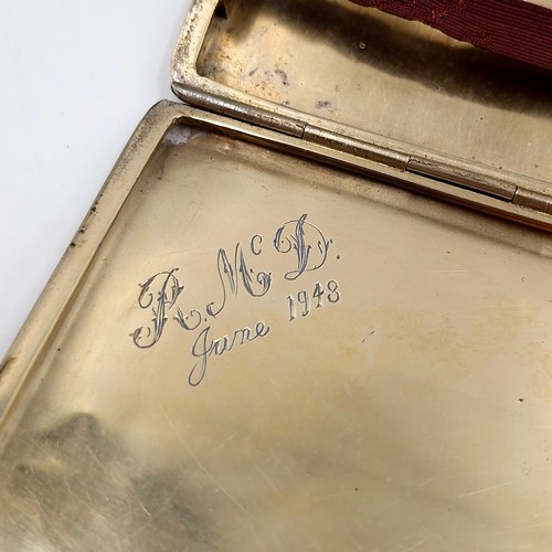 598 - A nice example of a sterling silver cigarette case with silver gilt interior hallmarked Birmingham d... 