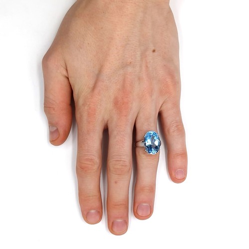 599 - Star Lot : A nice example of a huge blue topaz gemstone ring set in white gold (375). Ring size - Q.... 