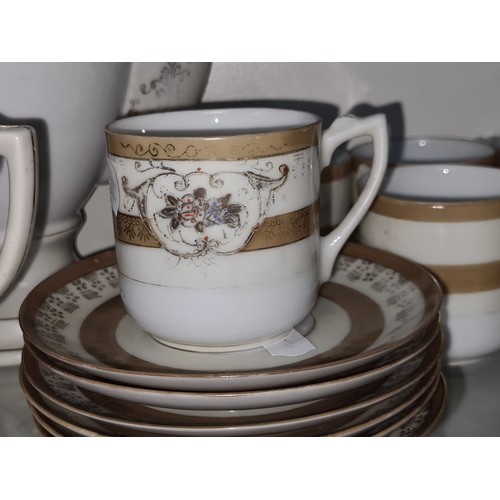 746 - A collection of 15 vintage Japanese hand painted crockery set including coffee pot, cups and saucers... 