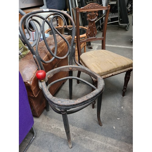 943 - Two antique chairs including a Bentwood chair and an Edwardian chair..