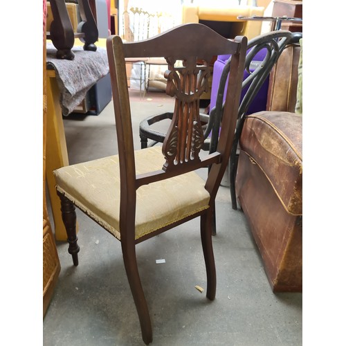 943 - Two antique chairs including a Bentwood chair and an Edwardian chair..