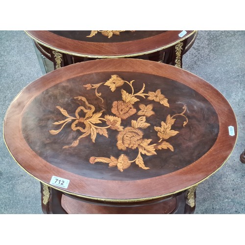 712 - Star Lot : A stunning pair of matching French baroque style oval shaped side tables with profuse flo... 