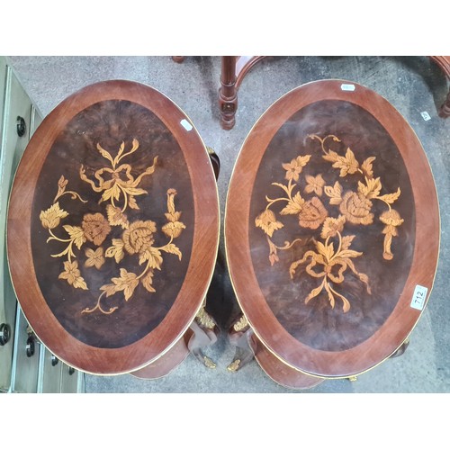 712 - Star Lot : A stunning pair of matching French baroque style oval shaped side tables with profuse flo... 