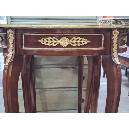 712 - Star Lot : A stunning pair of matching French baroque style oval shaped side tables with profuse flo... 