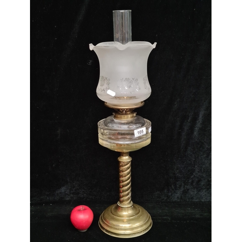 105 - A gorgeous brass column oil lamp featuring barley twist stem, original glass chimney and etched glas... 