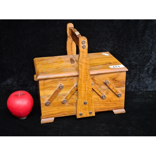 117 - A well made hand crafted vintage walnut sewing box with various compartments.