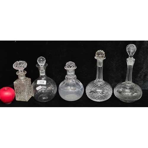 118 - A selection of five decanters all complete with original stoppers including a lovely cut glass examp... 