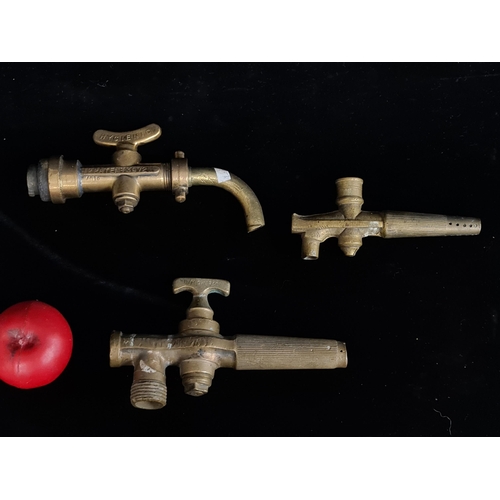 127 - Three vintage solid brass faucets / taps .