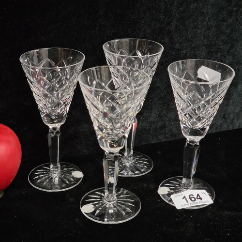 164 - Four Waterford Crystal large stemmed glasses in the Tyrone pattern. In good condition with acid mark... 