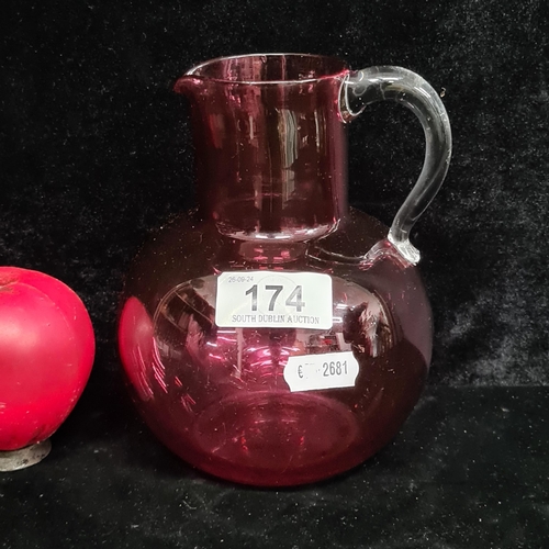 174 - A gorgeous Victorian handblown cranberry glass water jug. In good condition.