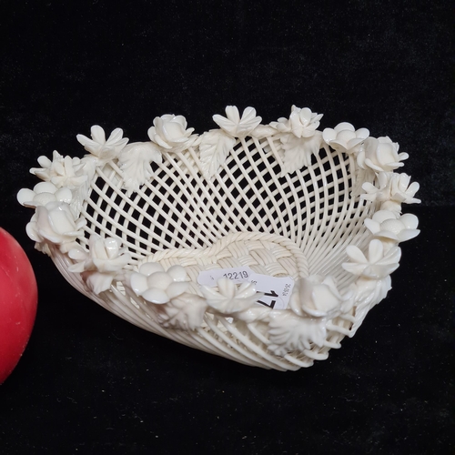 175 - An antique early  Belleek basket ware porcelain heart shaped dish. In good condition. So much work i... 