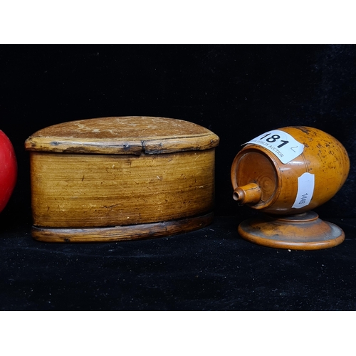 181 - Two antique 19th century Treenware wooden items including a maple string holder in the form of a bar... 