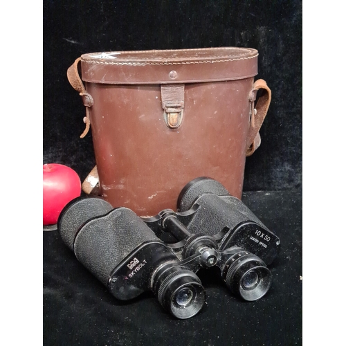 193 - A pair of Skybolt 10 x 50 binoculars in original leather carry case.