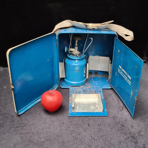 217 - A vintage 1970's camping stove in original carrier tin with 