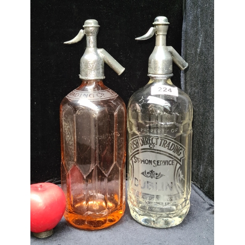 224 - Two vintage Irish soda siphons from the Irish Direct Trading Co., including a rare Dublin example an... 