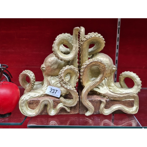 237 - A pair of super fun gilt Octopus bookends. From a top UK interior design company.