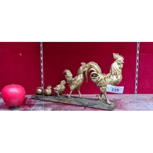 239 - A gilt chicken / Cockerel figure showing the evolution of the chicken. Brand new from a top Uk desig... 