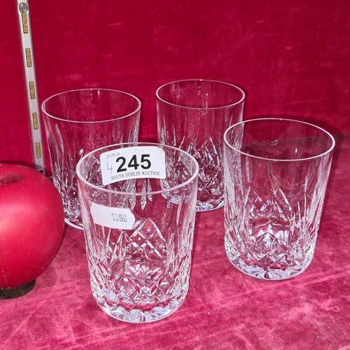 245 - A set of 4 Waterford Crystal Whiskey tumbler glasses in the Lismore pattern. In good condition, acid... 