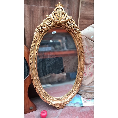 249 - Star Lot : A fabulous large French style gilt framed oval mirror. Very elaborate design.
MM: W 63cm ... 