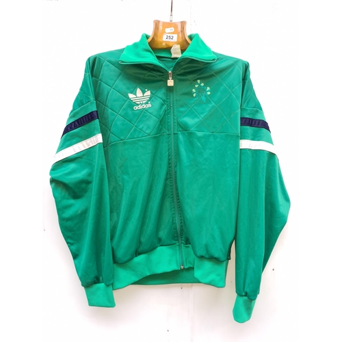 252 - A very retro 1980's Irish team Rugby Adidas zip sports top / track jacket. Marked size 5