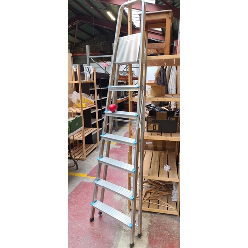 253 - A set of Beldray aluminum step ladders. Seven steps in good condition. RRP €265 for similar model on... 