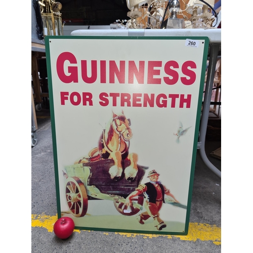 260 - A large printed metal wall Plaque advertising sign for 'Guinness'. Features 'Guinness for Strength'.