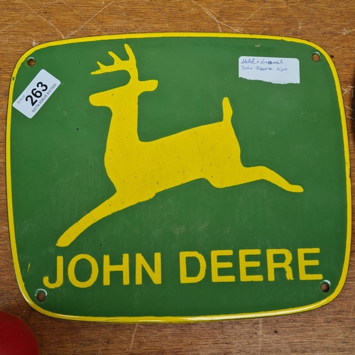 263 - A wonderful heavy enameled metal sign advertising John Deere. Hand painted with the brands classic l... 