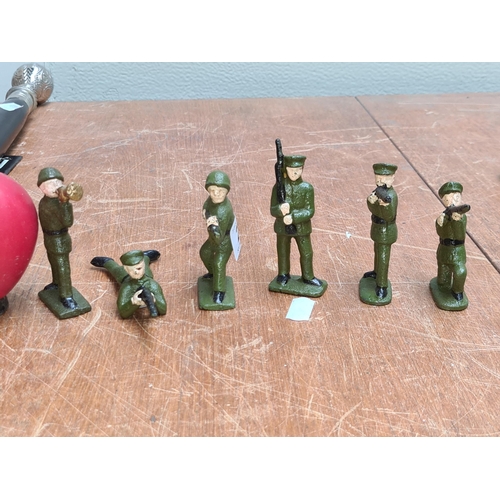 268 - Six cast metal Irish soldiers.