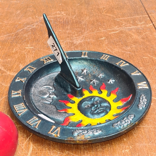 271 - A cast metal garden sun dial in a painted metallic teal blue.