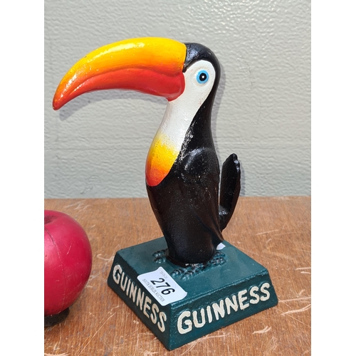 276 - A cast metal figure of a toucan advertising Guinness.