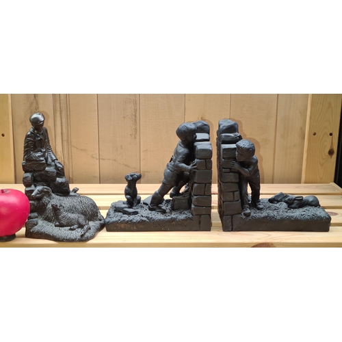 285 - A pair of heavy 'Genesis Fine Arts' Book ends featuring 'Boys playing Hide and Seek with a Dog and R... 