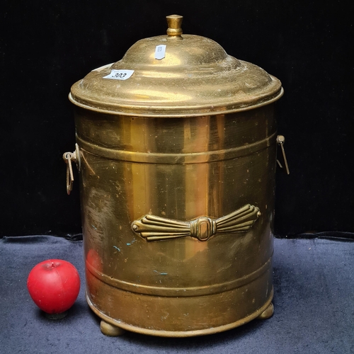 303 - A large Art Deco brass coal bucket.