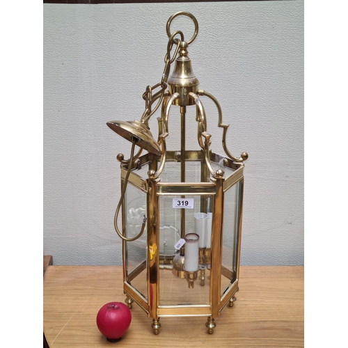 319 - Star Lot : A quality brass pendant hall light with octagonal glass design.  From a fabulous large Ge... 