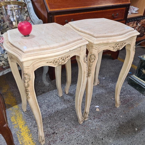 362 - Star Lot : A striking pair of Louis XV style marble top cream side tables with cabriole legs. In sup... 