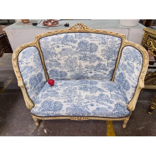 370 - Star Lot : A classic Louis XV style toile de Jouy blue & beige two seater. Gorgeous piece making sur... 