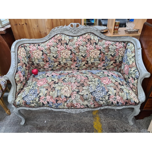 376 - Star Lot : A fantastic French style two seater sofa, painted in a rustic grey tone and upholstered w... 