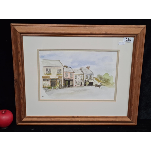 89 - A charming original watercolour on paper painting featuring a traditional Irish street. Initialed 'K... 